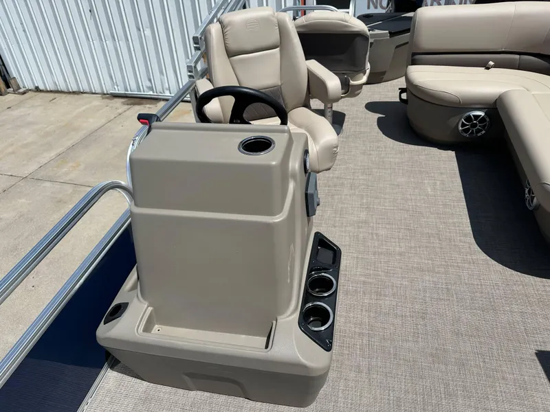 Slide: The Image of 2025 Sun Tracker Bass Buggy 18 DLX interior with steering console and seating. - 20