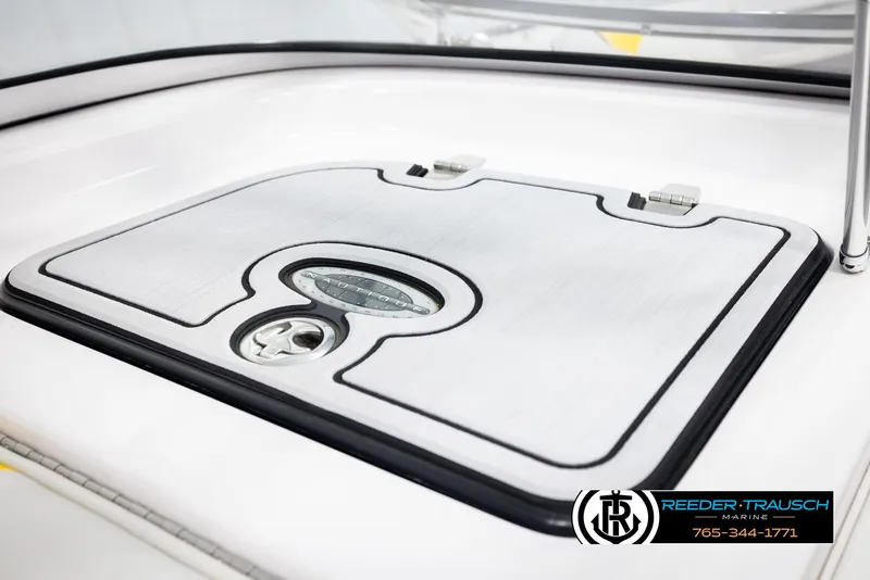 Slide: The Image of 2005 Correct Craft 226 Natique boat hatch with Reeder-Trausch Marine logo. - 28