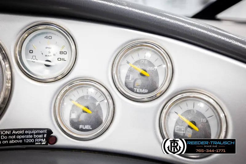 Slide: The Image of Close-up of 2005 Correct Craft 226 Natique boat dashboard gauges. - 35