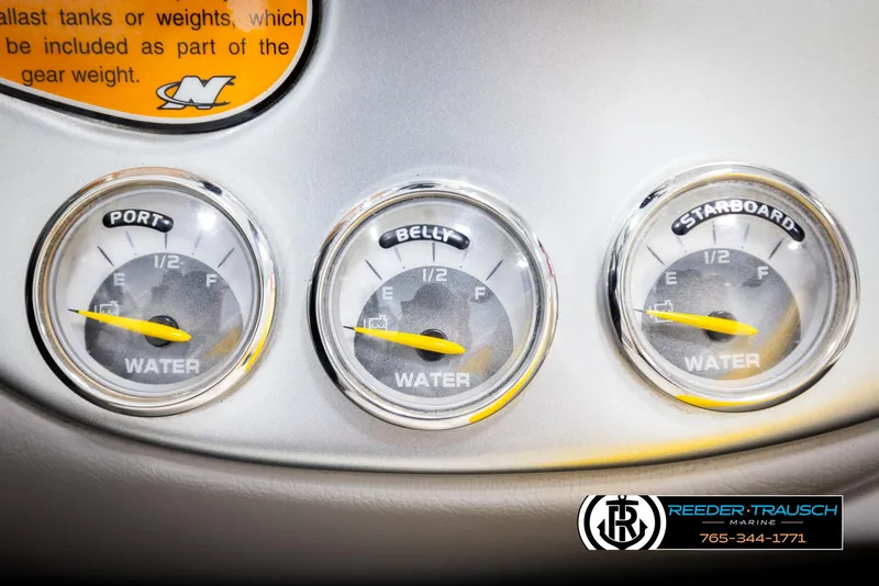 Slide: The Image of 2005 Correct Craft 226 Natique water level gauges for port, belly, and starboard. - 38