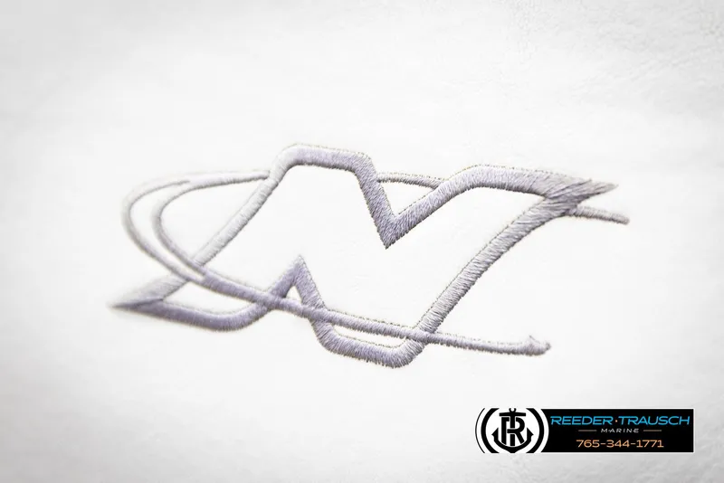 Slide: The Image of Embroidered logo on 2005 Correct Craft 226 Nautique boat upholstery. - 41