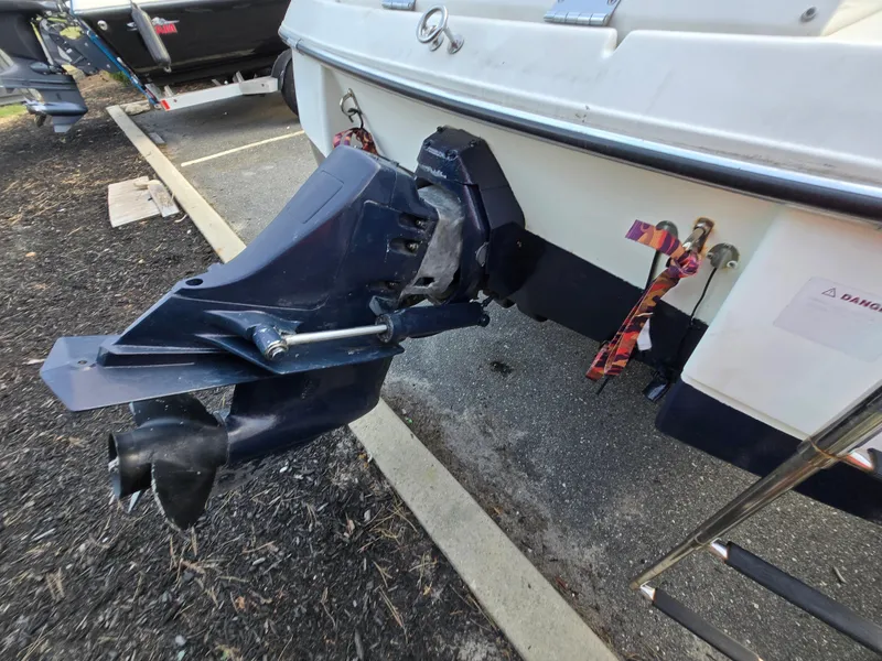 Slide: The Image of 2002 Glastron DX 215 boat stern drive and propeller detail. - 11