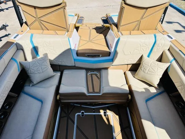 Slide: The Image of 2024 Nautique G25 Paragon interior with luxurious seating and modern design. - 27
