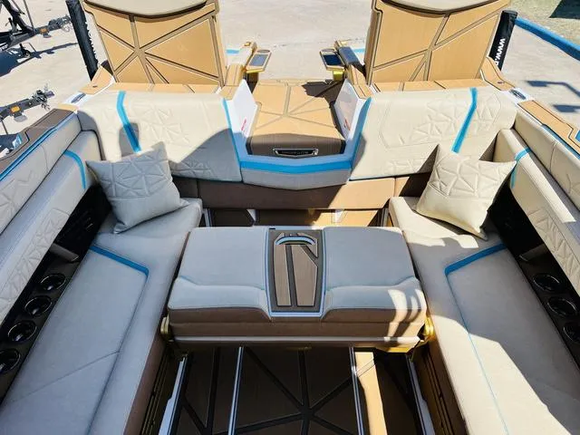 Slide: The Image of 2024 Nautique G25 Paragon interior with luxurious seating and modern design. - 28