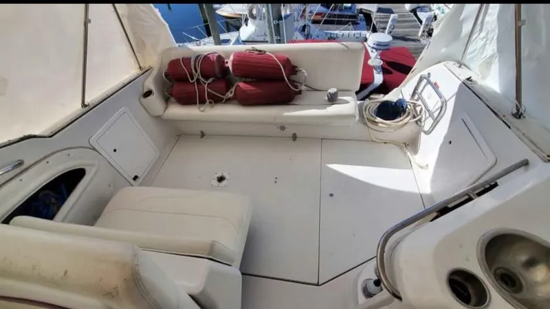 Slide: The Image of 1997 Chris-Craft 34 boat interior with seating and marine equipment. - 9