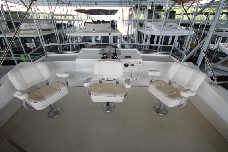 Slide: The Image of Captain's chairs on the deck of a 2011 Gibson 50 Cabin Yacht. - 18