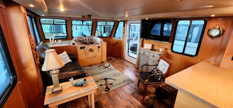 Slide: The Image of Luxurious interior of 2011 Gibson 50 Cabin Yacht with modern furnishings and helm station. - 36