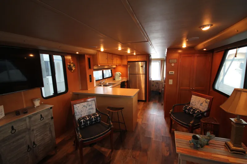 Slide: The Image of Luxurious interior of 2011 Gibson 50 Cabin Yacht with modern kitchen and cozy seating area. - 45