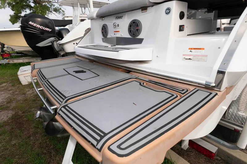 Slide: The Image of 2017 Four Winns H260 boat with swim platform and Mercury engine. - 7