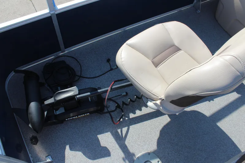 Slide: The Image of 2019 Sun Tracker Bass Buggy 16 XL Select boat interior with seat and trolling motor. - 10