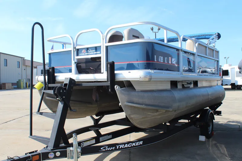 Slide: The Image of 2019 Sun Tracker Bass Buggy 16 XL Select pontoon boat on trailer. - 3
