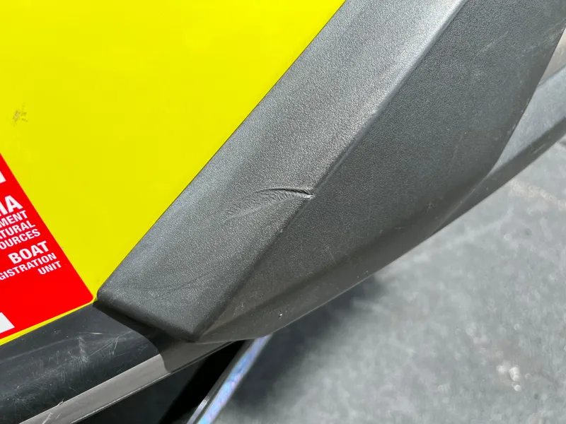 Slide: The Image of 2021 Yamaha WaveRunner VX Cruiser HO with visible hull scratch and registration sticker. - 8