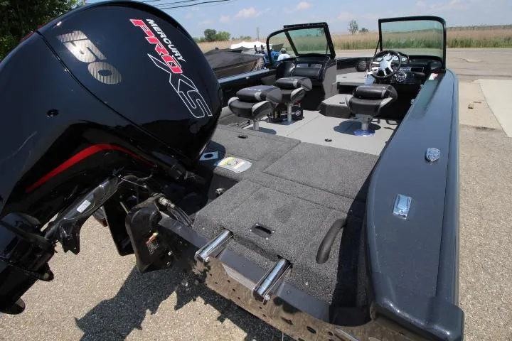 Slide: The Image of 2025 Lund 1875 Crossover XS boat with Mercury 150 engine, interior view. - 6