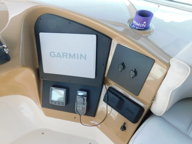 Slide: The Image of Control panel of 2002 Carver 450 Voyager Pilothouse with Garmin navigation system. - 32