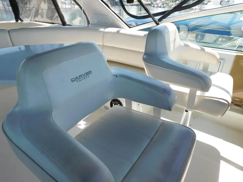 Slide: The Image of Interior of 2002 Carver 450 Voyager Pilothouse with plush seating and elegant design. - 33