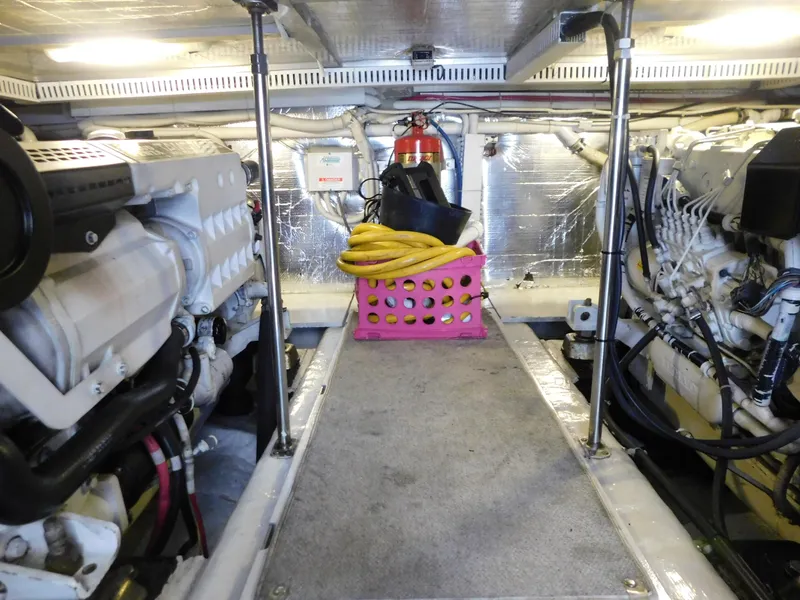 Slide: The Image of Engine room of 2002 Carver 450 Voyager Pilothouse with equipment and storage. - 39