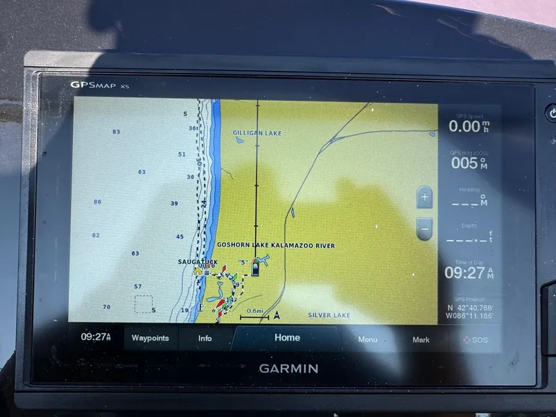 Slide: The Image of Garmin GPS display showing nautical map near Saugatuck, Michigan on a 2019 Brig Eagle 650. - 33