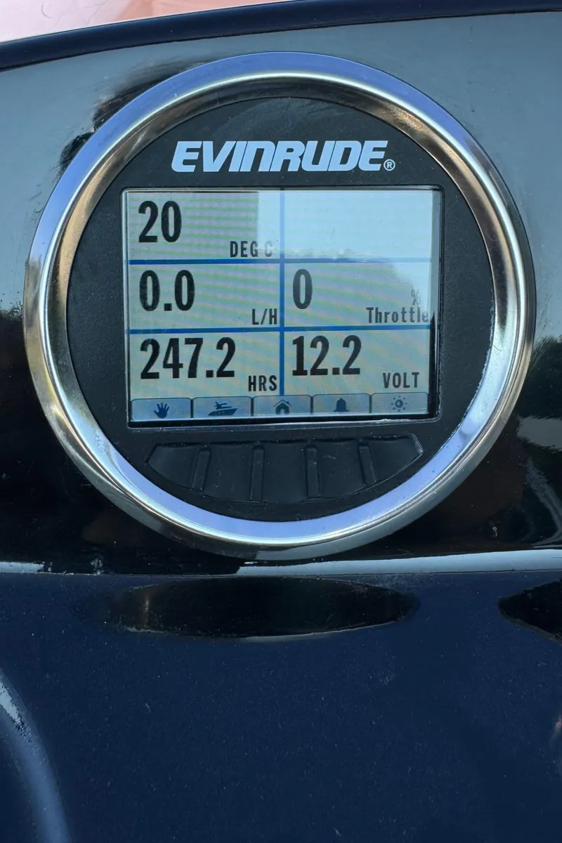 Slide: The Image of Evinrude display on 2019 Brig Eagle 650 showing engine hours and voltage. - 34