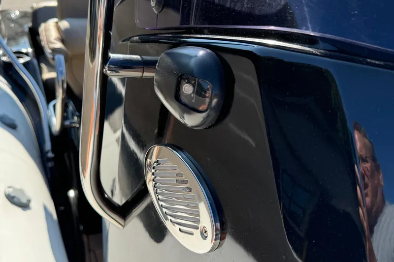 Slide: The Image of Close-up of a 2019 Brig Eagle 650 boat's side panel with a speaker and camera. - 39