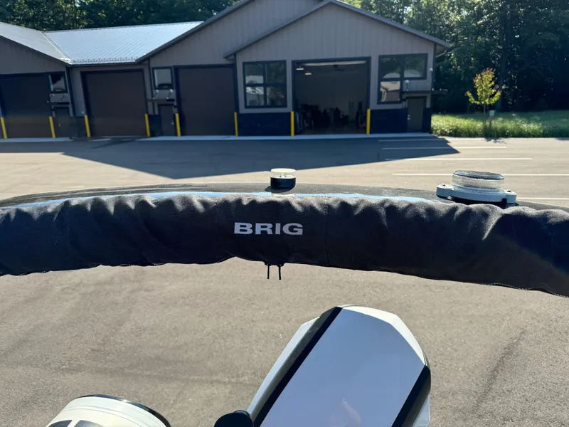 Slide: The Image of 2019 Brig Eagle 650 boat steering wheel with building in background. - 42