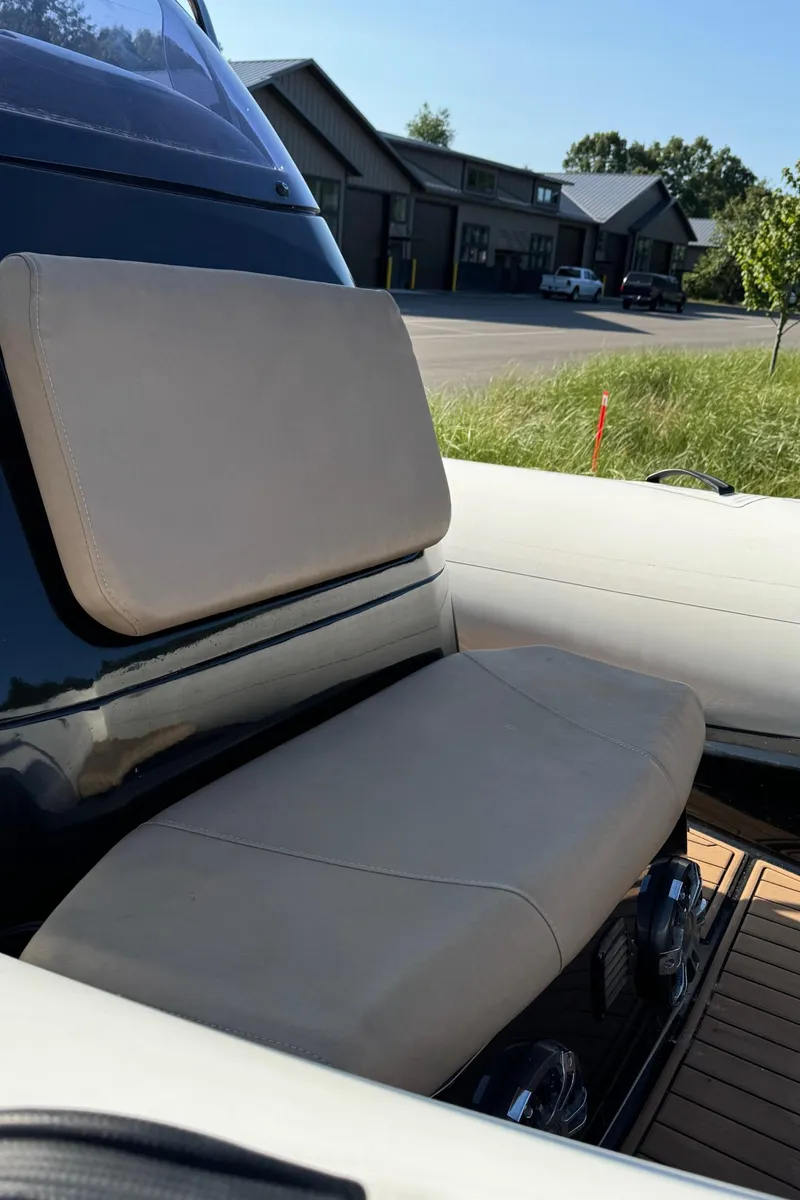 Slide: The Image of 2019 Brig Eagle 650 boat interior with beige seating and modern design. - 8