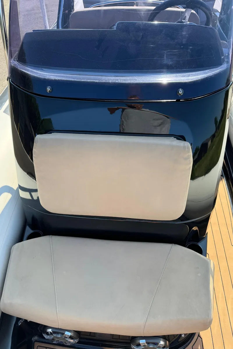 Slide: The Image of 2019 Brig Eagle 650 boat console with cushioned seating and sleek design. - 9