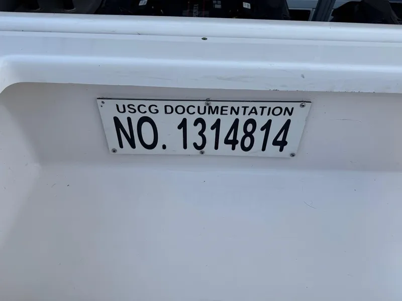 Slide: The Image of USCG documentation number on 2016 Regal 35 Sport Coupe boat. - 12