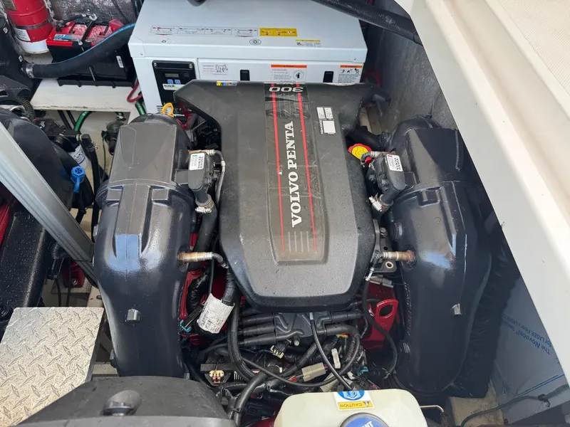 Slide: The Image of Volvo Penta engine in 2016 Regal 35 Sport Coupe boat. - 13