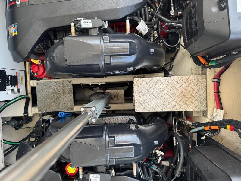 Slide: The Image of Engine compartment of a 2016 Regal 35 Sport Coupe with visible components and wiring. - 15