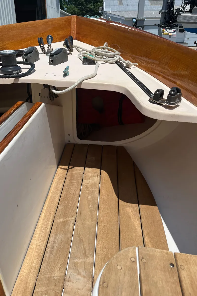 Slide: The Image of Wooden deck of 2004 Custom Sakonnet 23 sailboat with rigging and winches. - 17