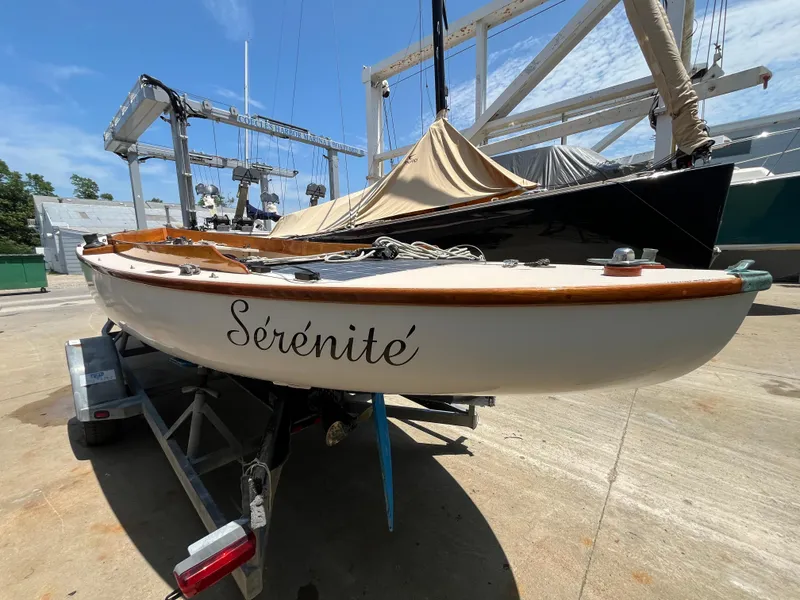 Slide: The Image of Custom Sakonnet 23 sailboat "Sérénité" on trailer, sunny day, marina background. - 6