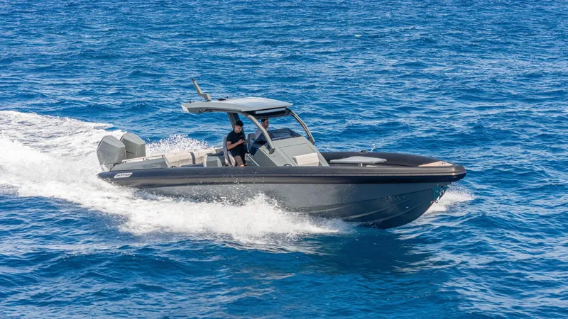 Slide: The Image of 2025 Skipper-BSK 38 boat cruising on open blue sea. - 26