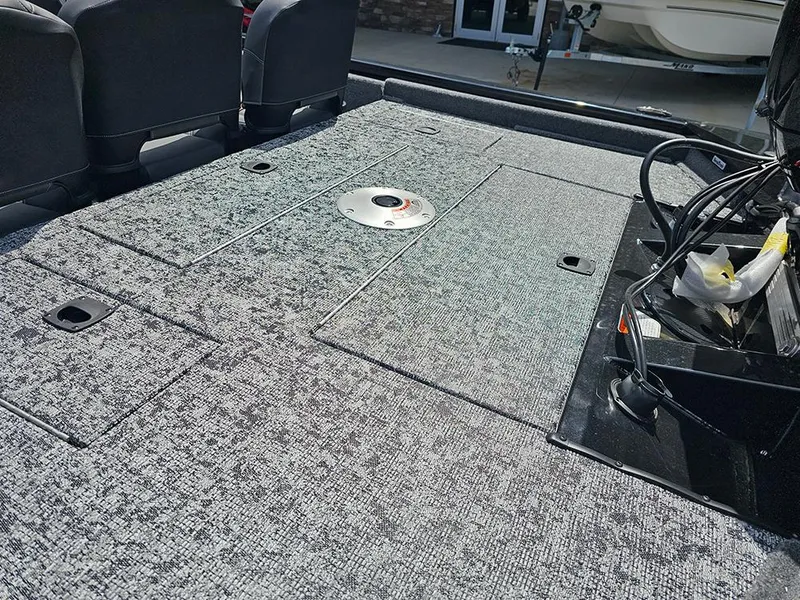 Slide: The Image of 2026 Tracker Pro Team 175 Crappie Edition boat deck with storage compartments and wiring. - 10