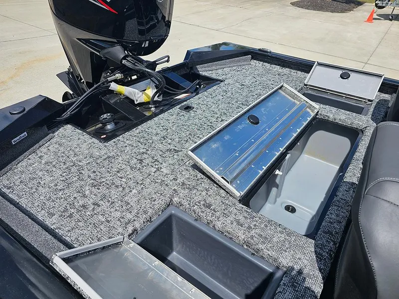 Slide: The Image of 2026 Tracker Pro Team 175 Crappie Edition boat interior with storage compartments. - 11