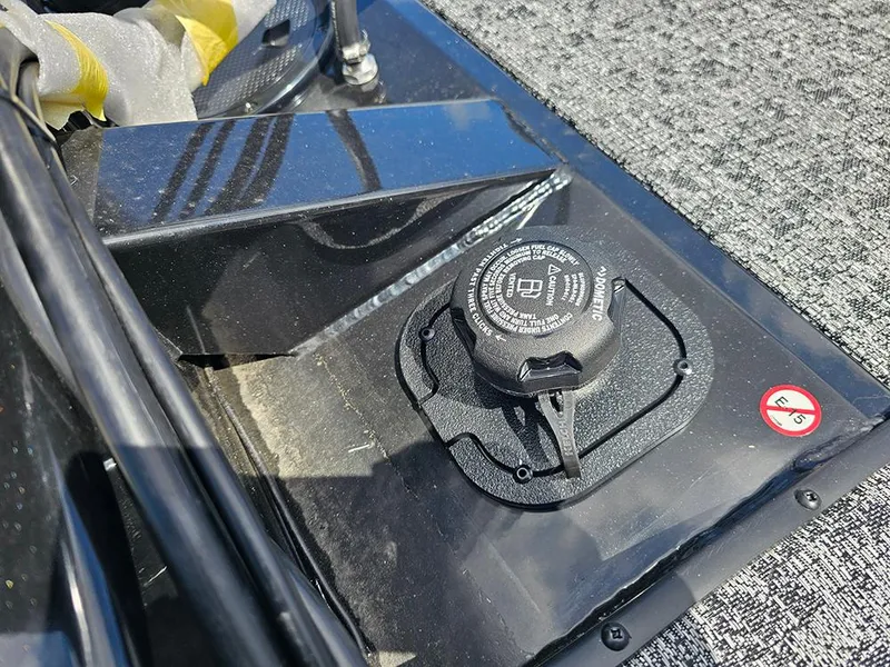 Slide: The Image of Fuel cap on 2026 Tracker Pro Team 175 Crappie Edition boat deck. - 12