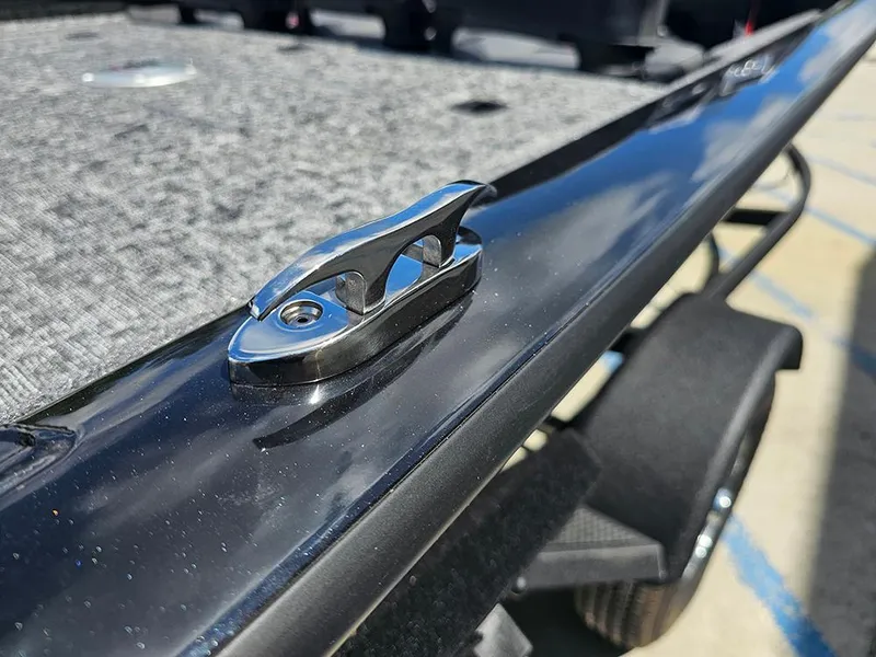 Slide: The Image of 2026 Tracker Pro Team 175 Crappie Edition boat cleat on sleek black surface. - 22
