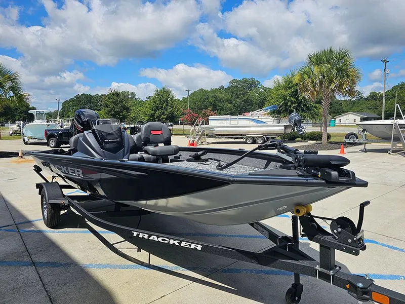 Slide: The Image of 2026 Tracker Pro Team 175 Crappie Edition boat on trailer, parked outdoors. - 5