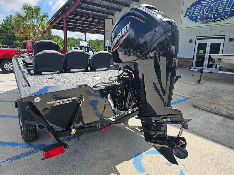 Slide: The Image of 2026 Tracker Pro Team 175 Crappie Edition boat with Mercury engine at dealership. - 9