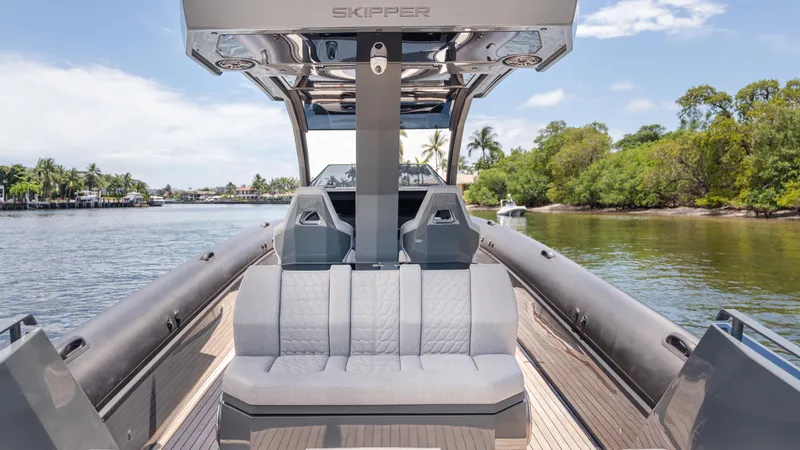 Slide: The Image of Luxury Skipper-BSK 38 yacht interior, 2025 model, cruising on a scenic river. - 39