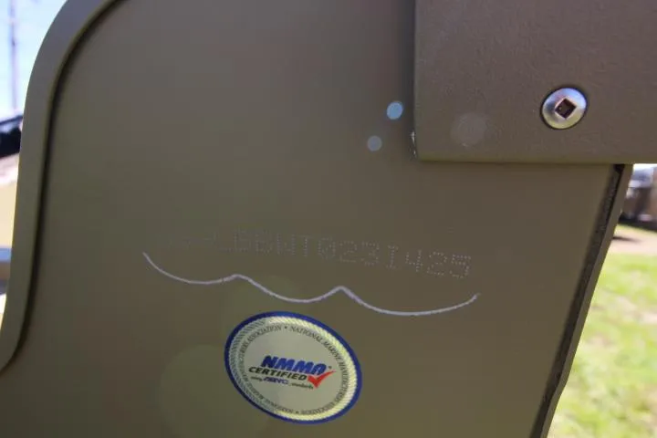 Slide: The Image of 2025 Lund 2075 Alaskan Tiller with NMMA certification sticker on hull. - 6