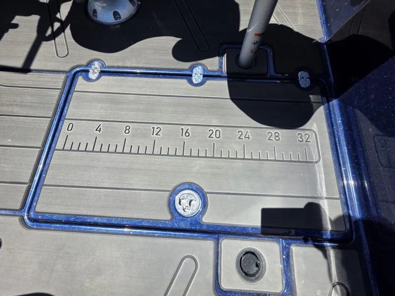 Slide: The Image of Deck of 2025 Nitro ZV19 Sport Pro boat with integrated measuring ruler. - 12