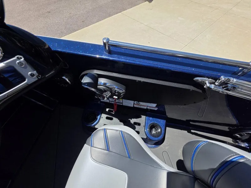Slide: The Image of 2025 Nitro ZV19 Sport Pro boat interior with steering controls and seating. - 14