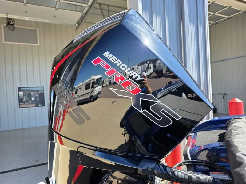 Slide: The Image of Mercury Pro XS engine on 2025 Nitro ZV19 Sport Pro boat in a garage setting. - 6