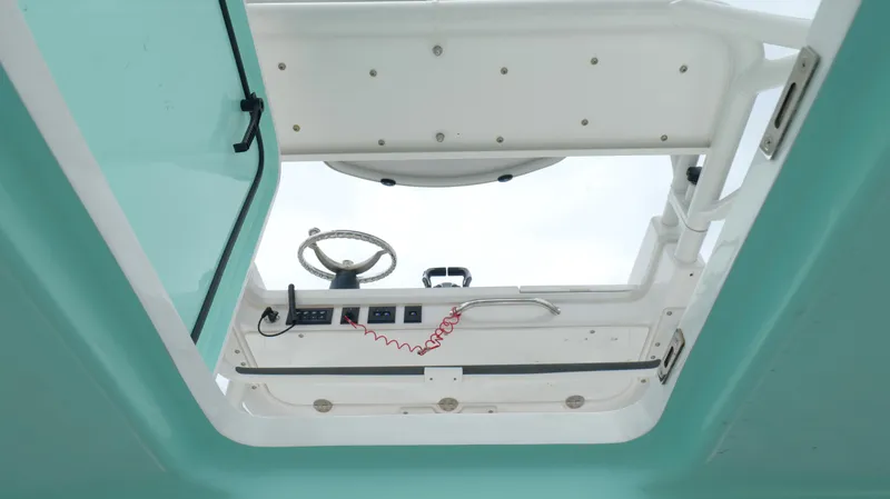 Slide: The Image of Interior view of 2023 Everglades 365 CC boat helm station. - 20