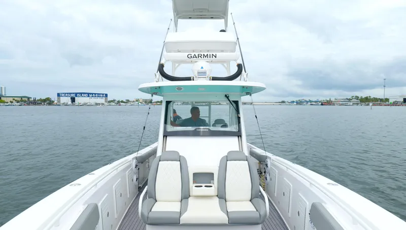 Slide: The Image of 2023 Everglades 365 CC boat on water near Treasure Island Marina. - 46