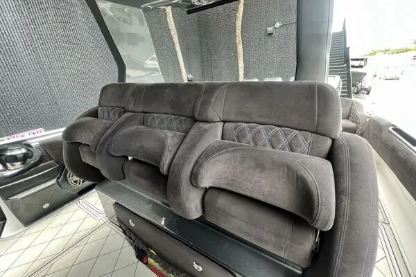 Slide: The Image of Luxurious seating in 2019 Nor-Tech 450 Sport Center Console boat interior. - 11