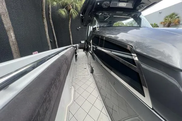 Slide: The Image of 2019 Nor-Tech 450 Sport Center Console boat with sleek design and modern features. - 20