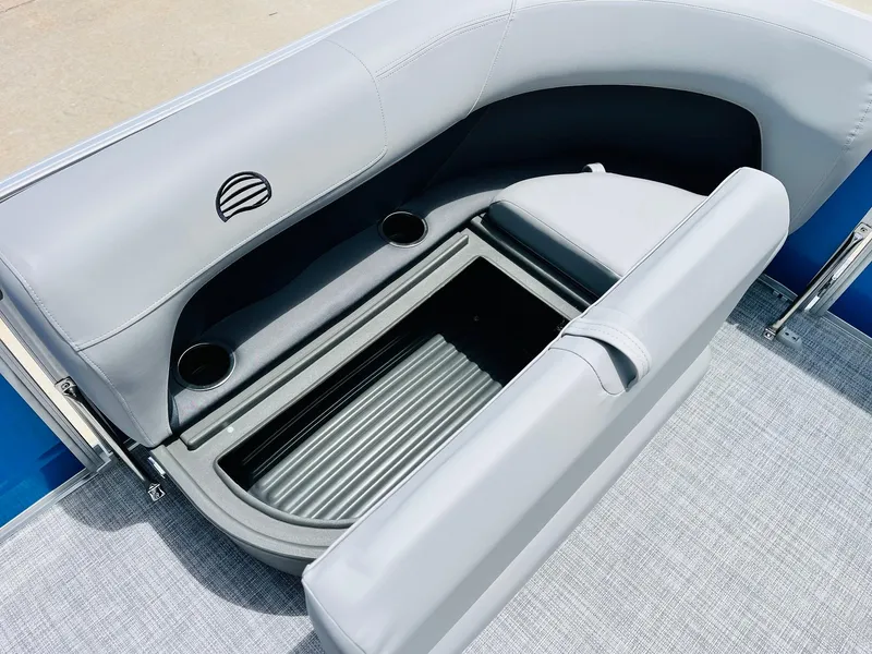 Slide: The Image of 2026 Sun Tracker Party Barge 16 DLX seating with storage and cup holders. - 18