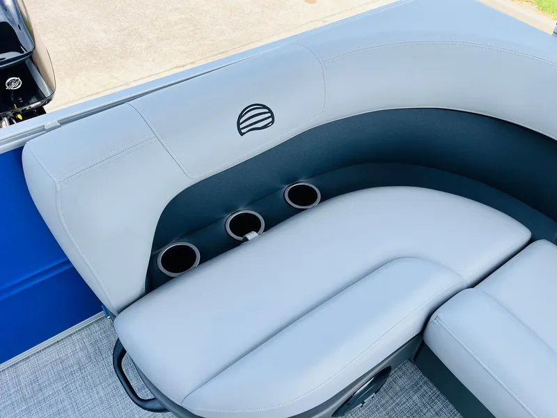 Slide: The Image of Luxurious seating with cup holders on 2026 Sun Tracker Party Barge 16 DLX pontoon boat. - 28