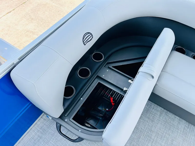 Slide: The Image of 2026 Sun Tracker Party Barge 16 DLX seating with storage and cup holders. - 30